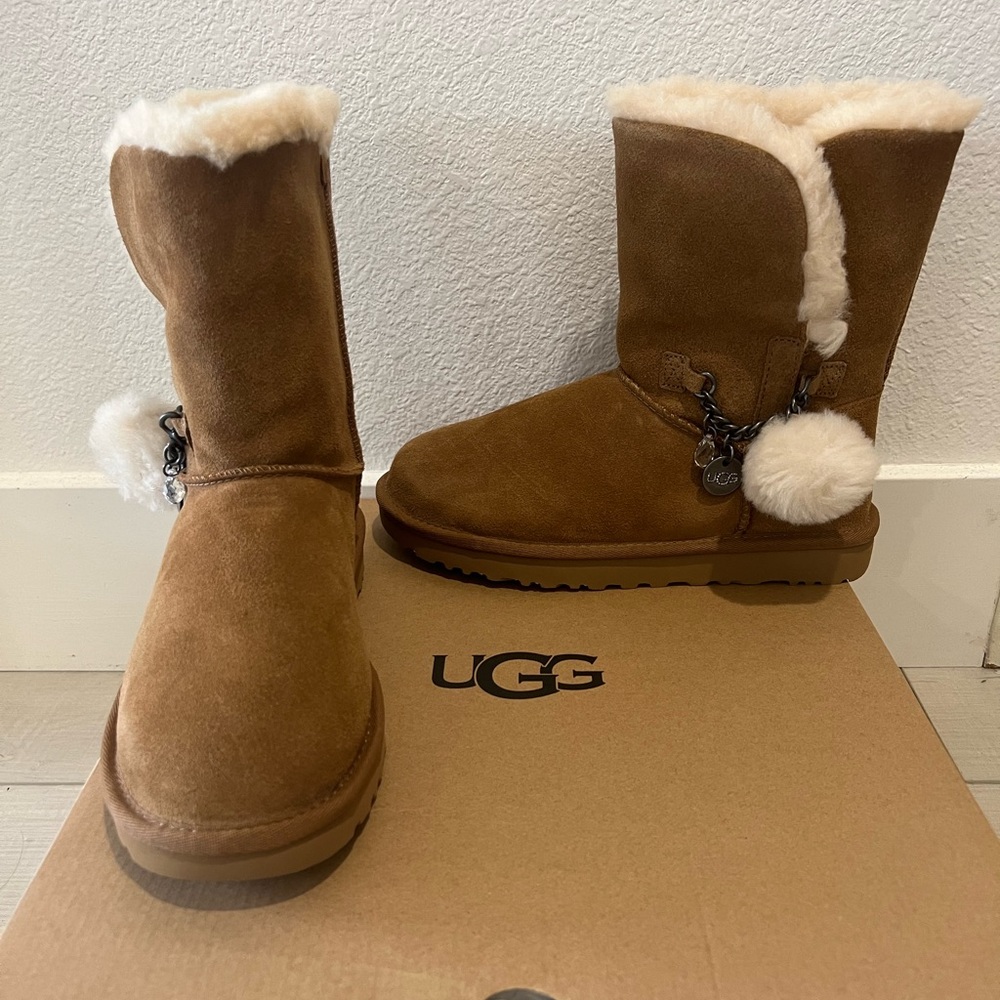 Ugg women’s classic short charm chestnut suede boots.